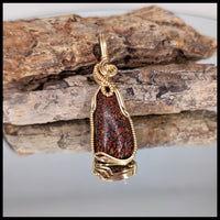FAS331JD Dinosaur Bone Pendant